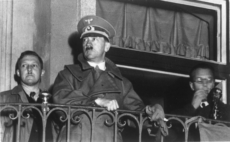 Hitler talks to the gathered Austrians from the balcony of the Linz City Hall